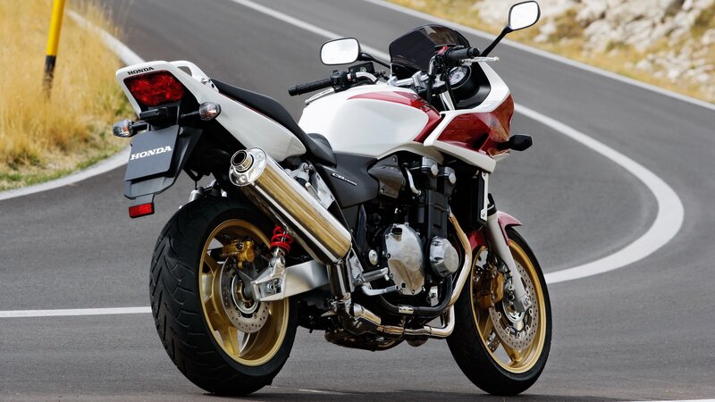 White and red Honda motorcycle