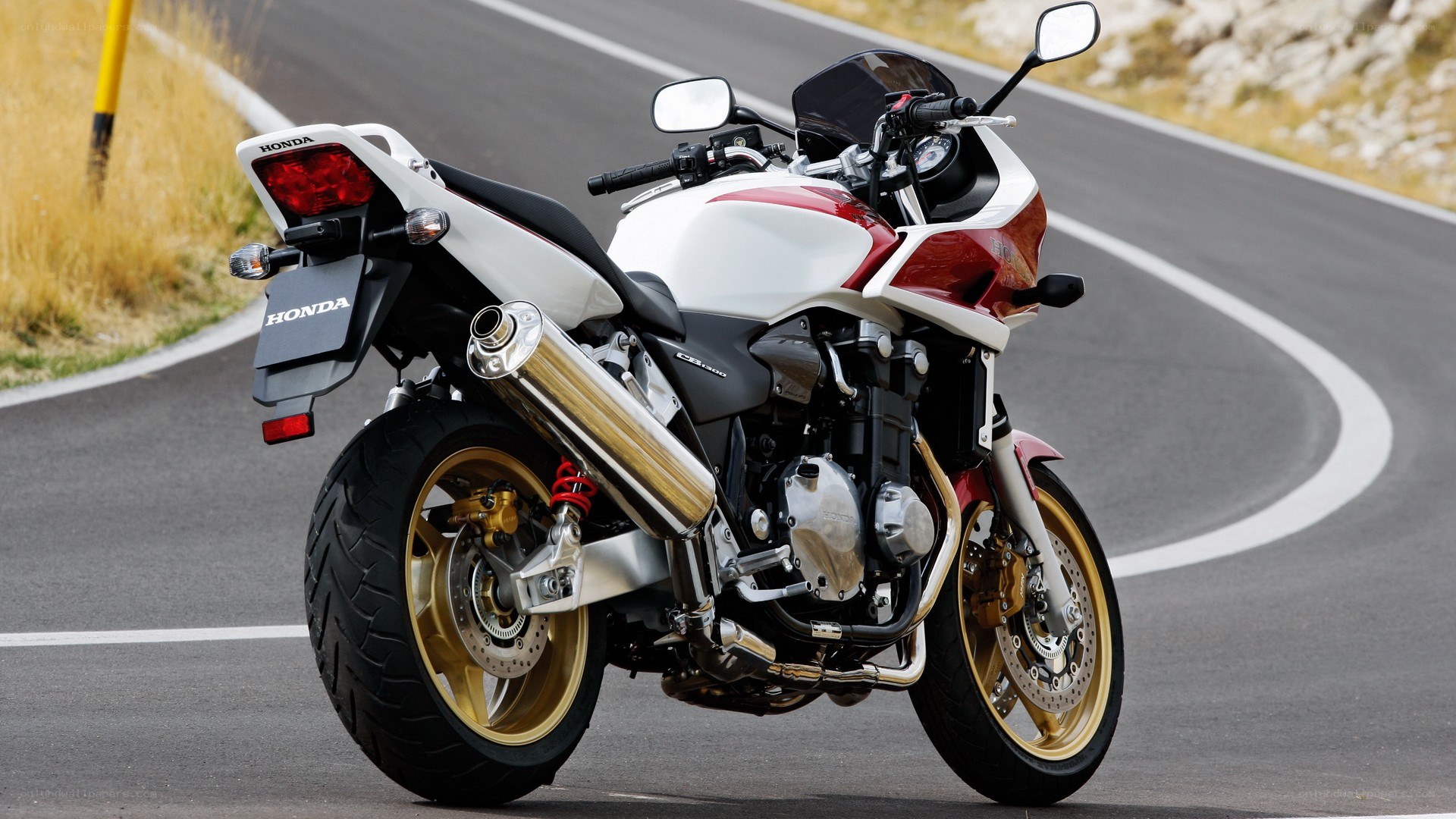 White and red Honda motorcycle