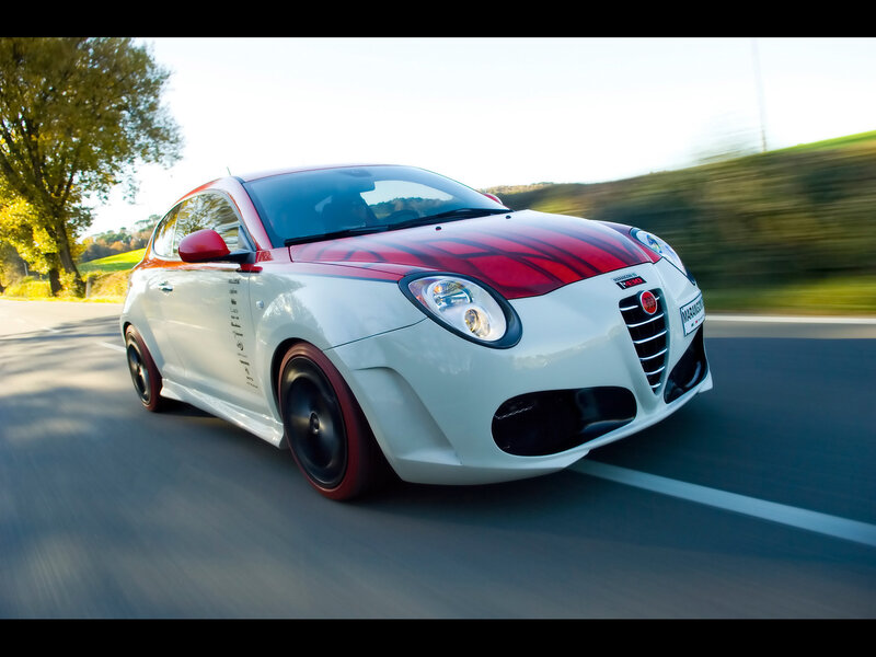 white and red sports car driving