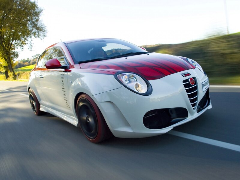 white and red sports car driving
