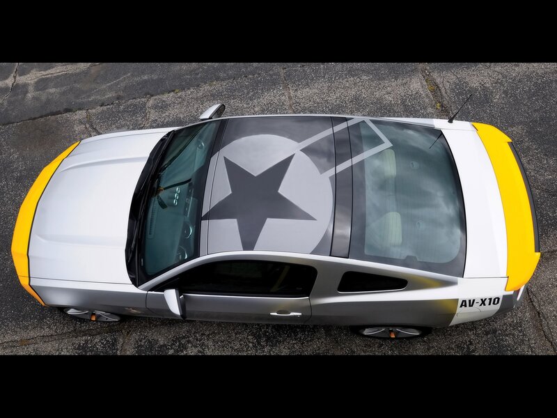 white and yellow car with star decal