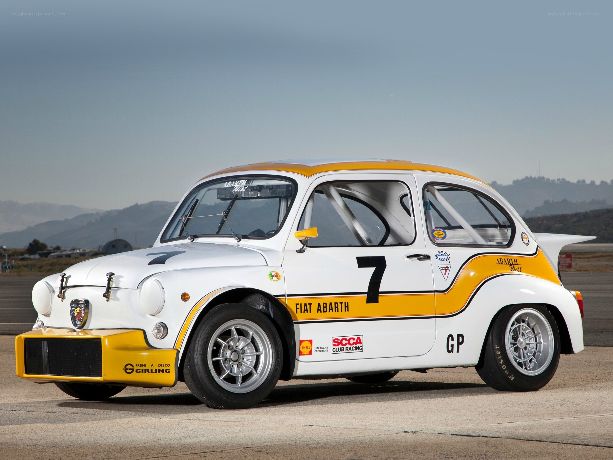 White and yellow Fiat Abarth race car