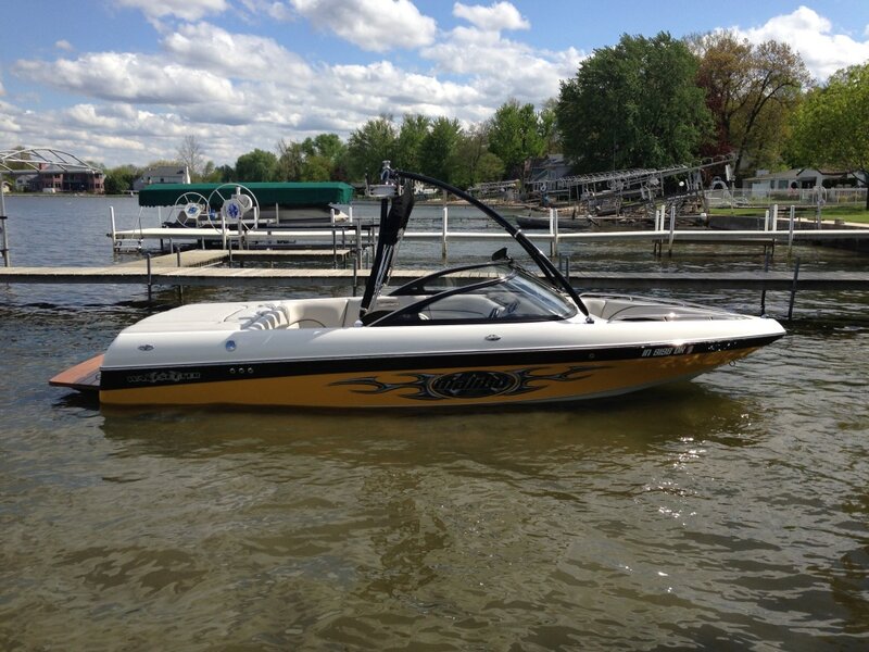 White and Yellow Speedboat