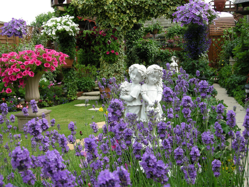 White Angel Statues in Garden