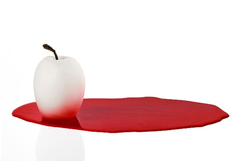 White Apple with Red Liquid