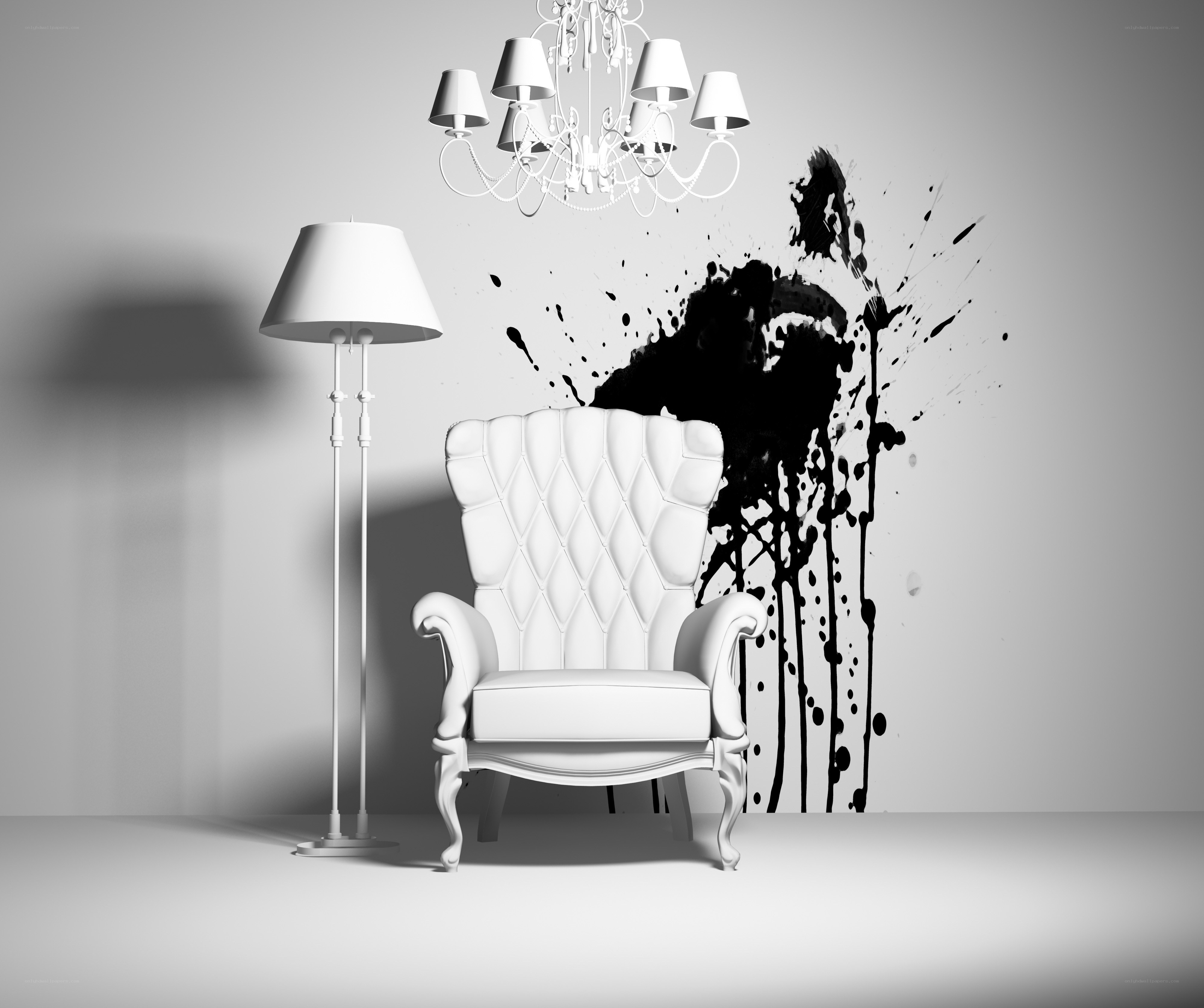 White armchair with black splatter