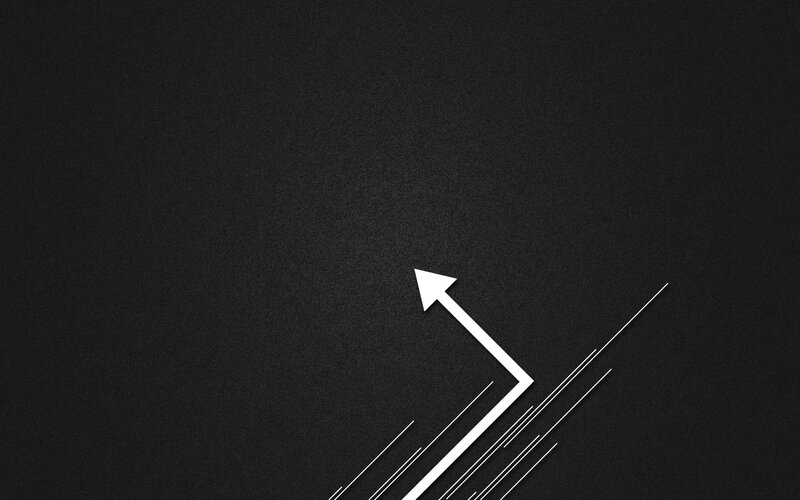 white arrow on black background
