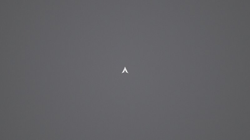 white arrow on gray background