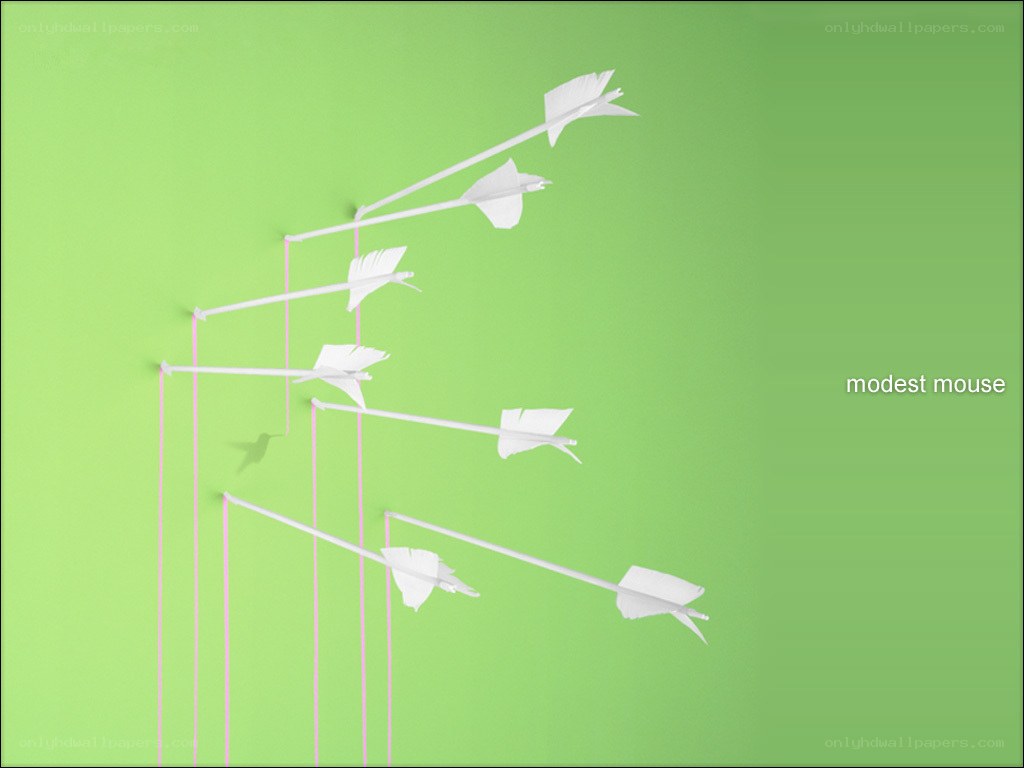 white arrows on green background