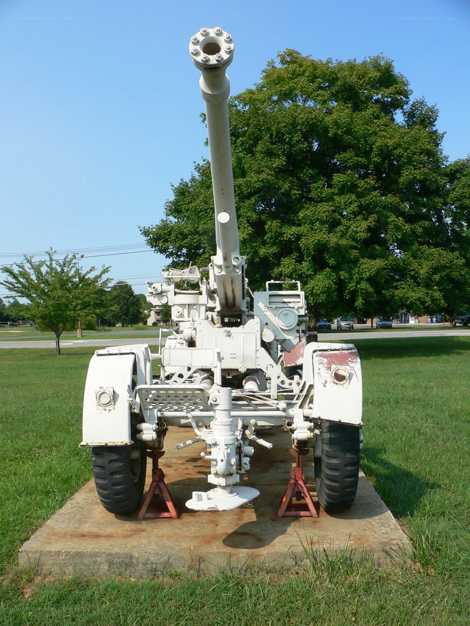 White artillery piece on display