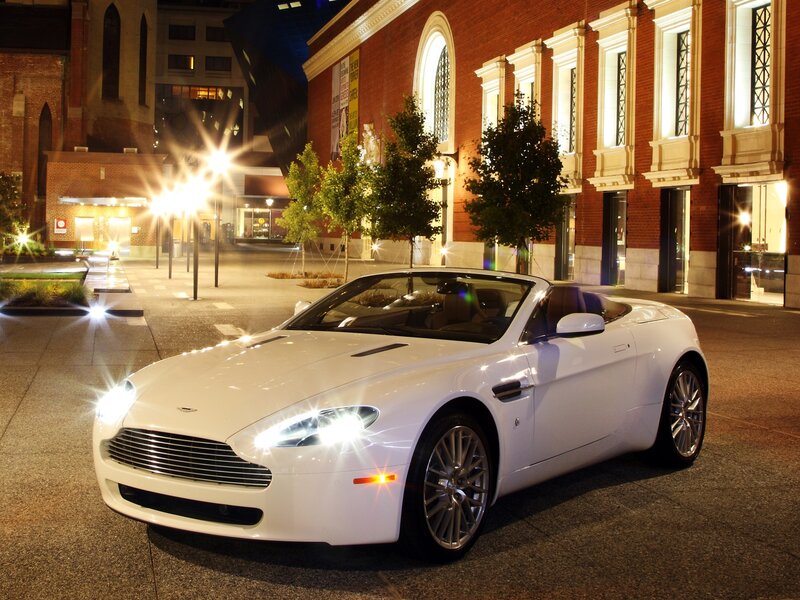 White Aston convertible at night