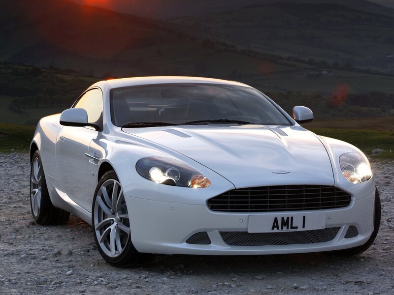 White Aston DB9 on gravel