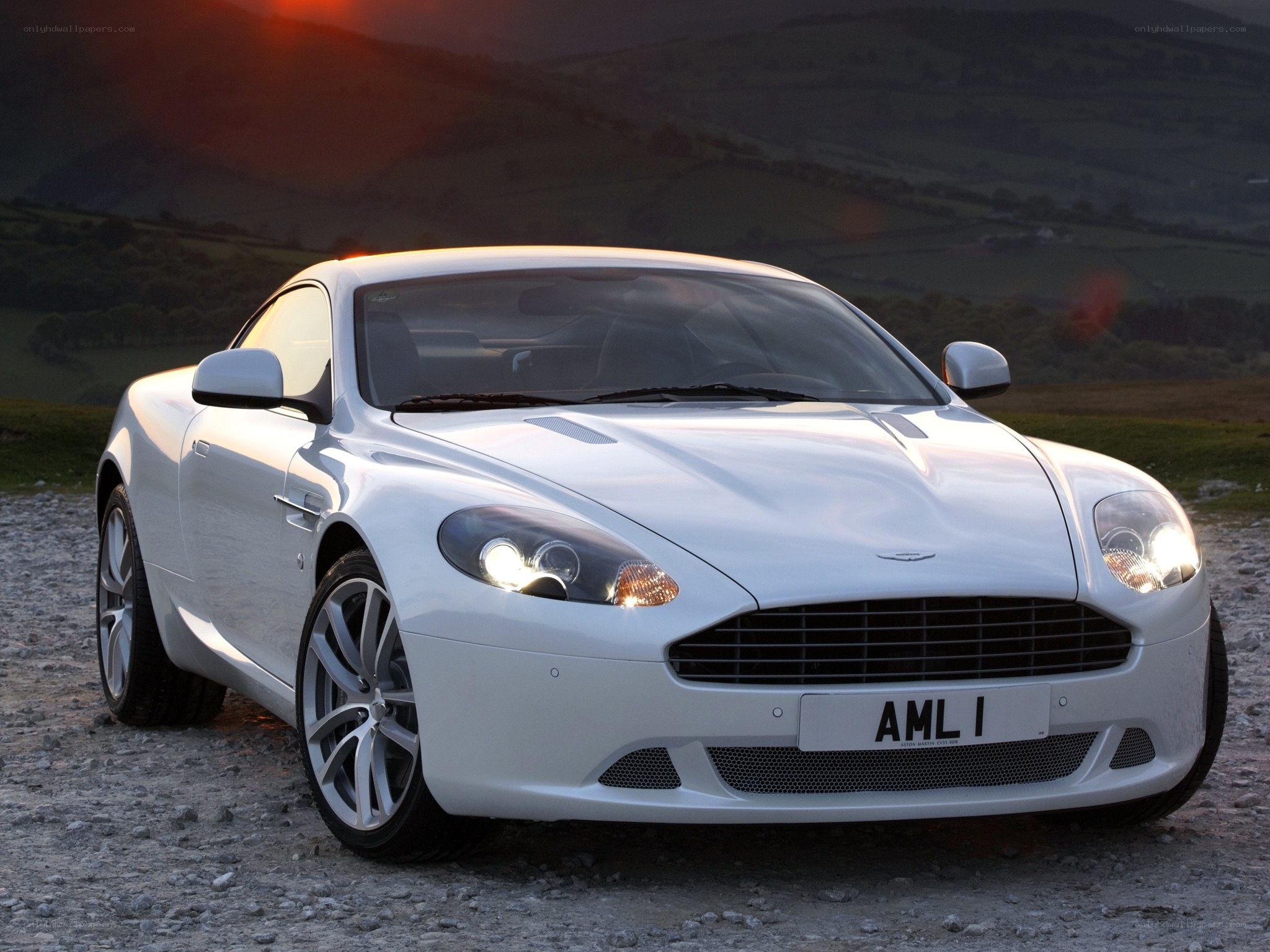 White Aston DB9 on gravel