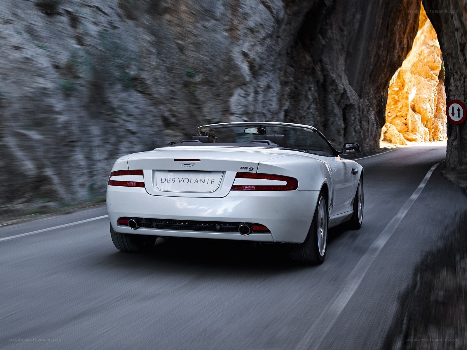 White Aston DB9 Volante driving