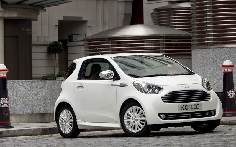 white aston martin car on street
