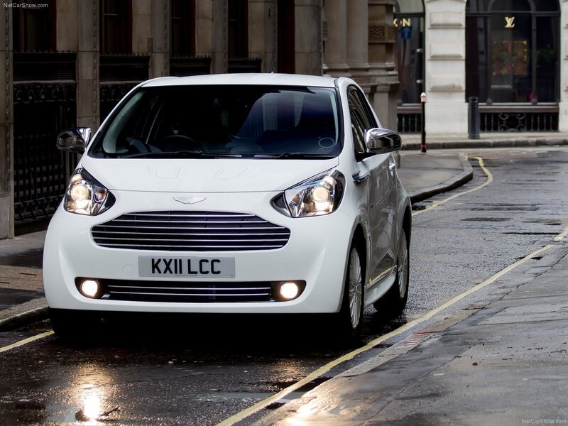 white aston martin car on street