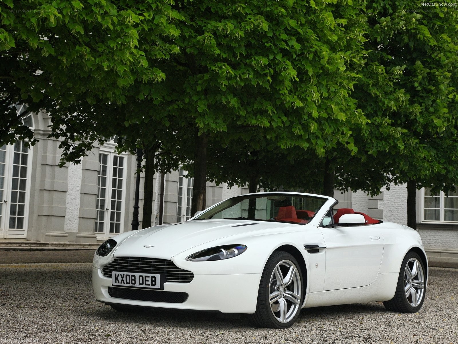 white aston martin convertible