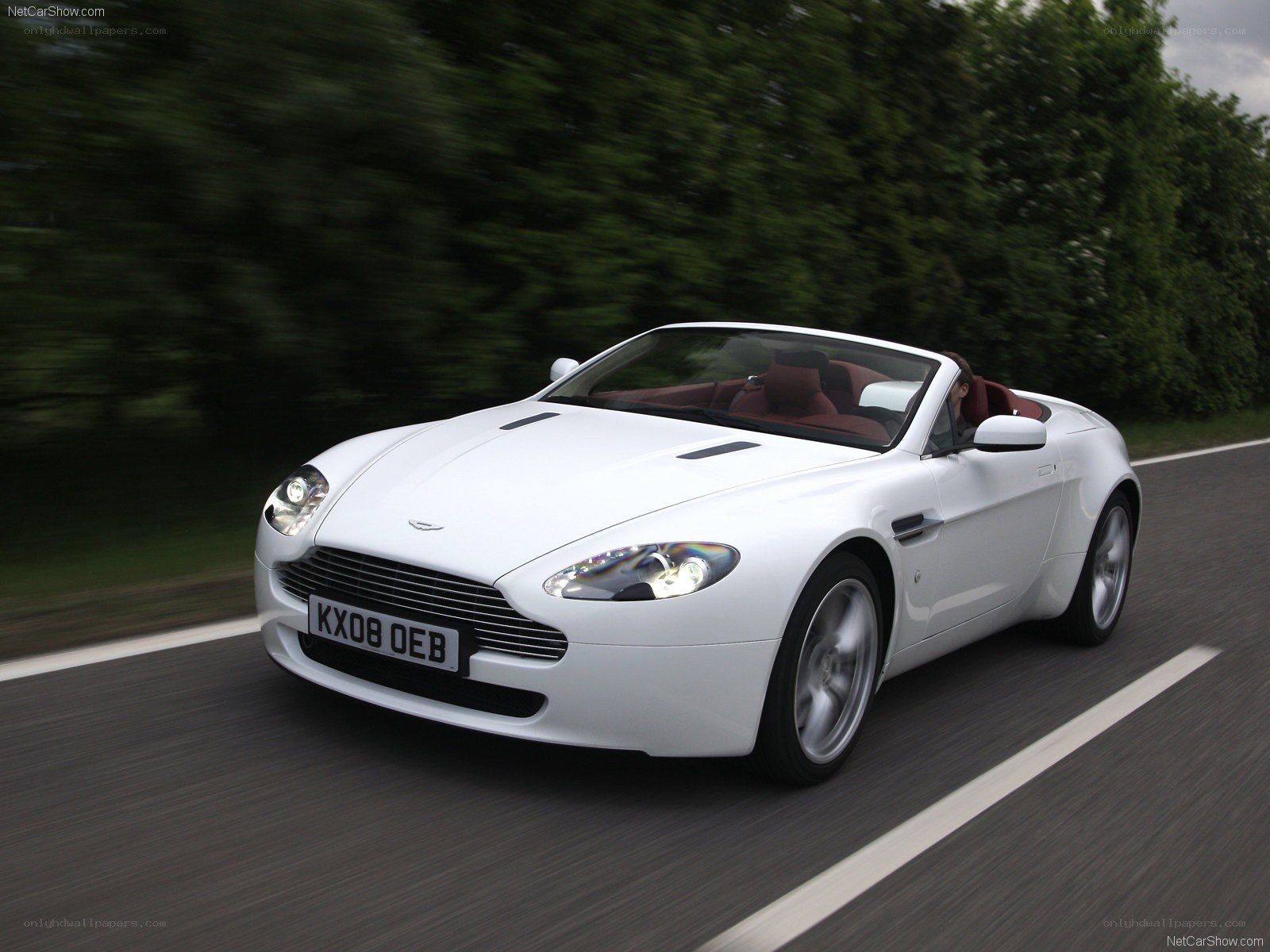 white aston martin convertible