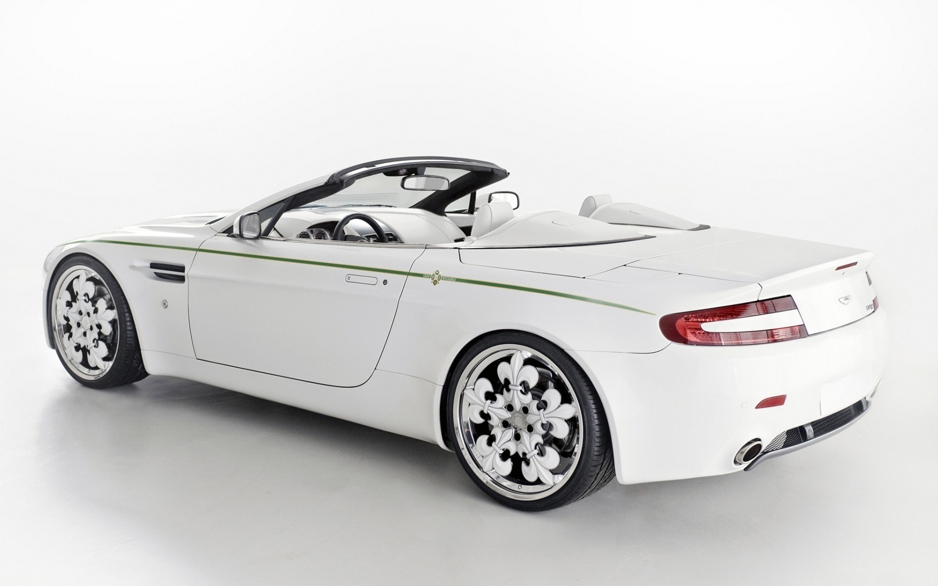 white aston martin convertible