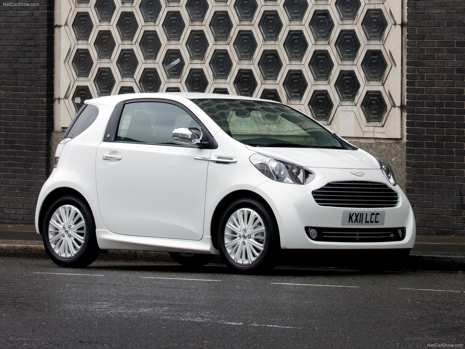 white aston martin cygnet
