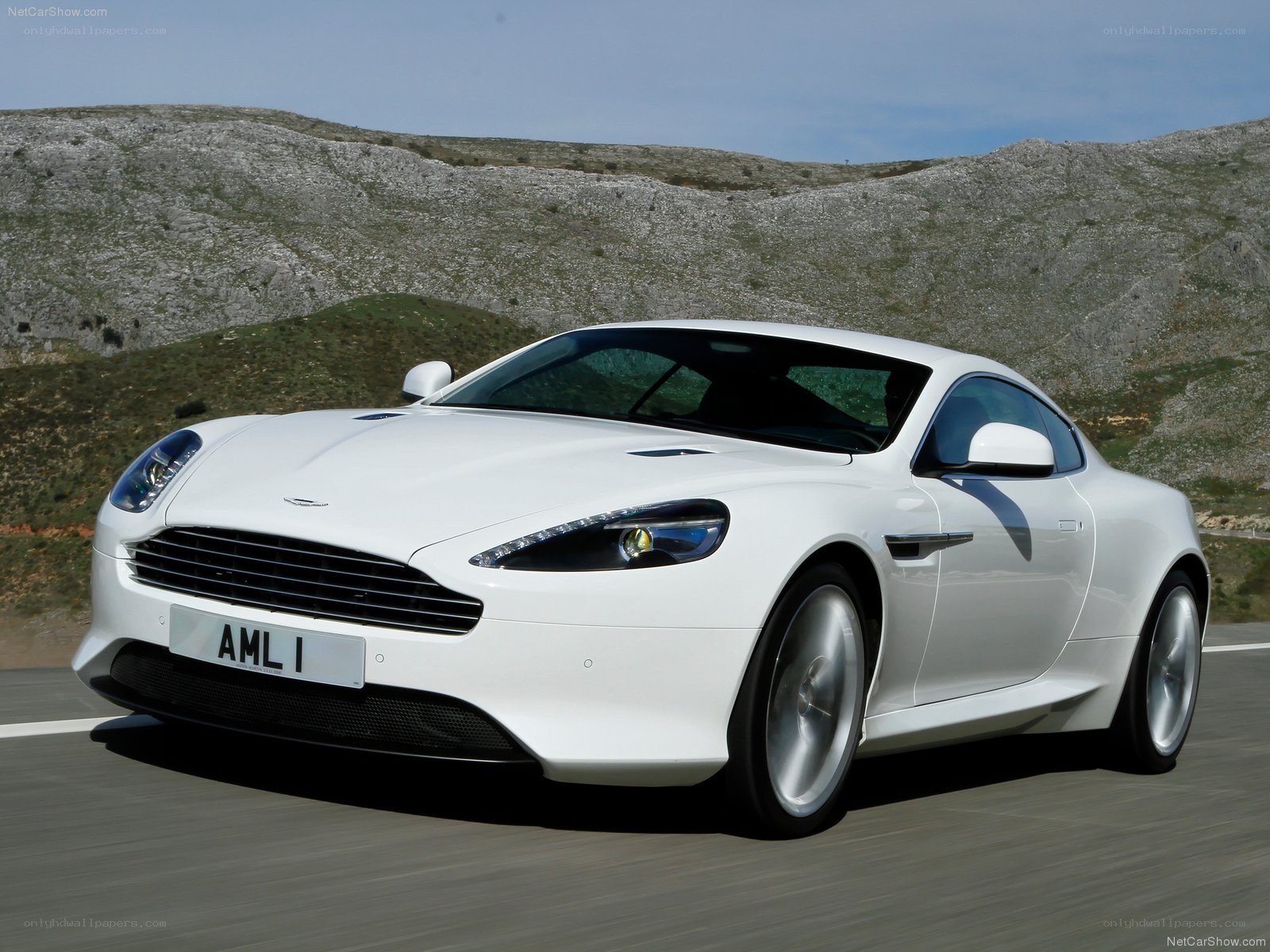 White Aston Martin DB9 in motion