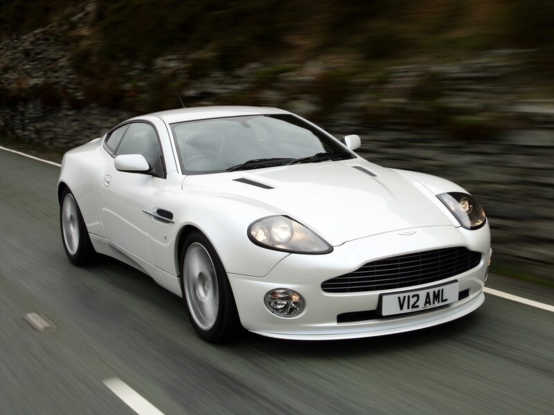 white aston martin driving
