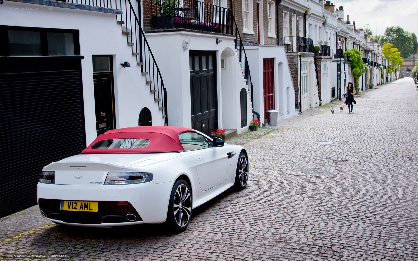 White Aston on a cobblestone street