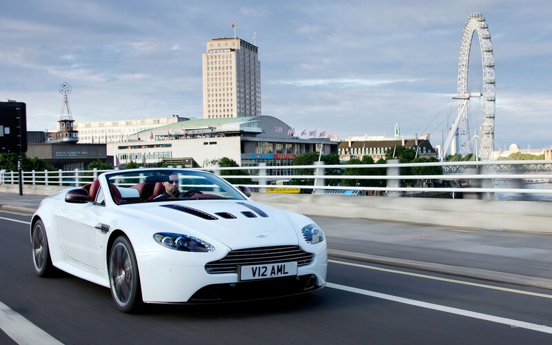 White Aston V12 convertible on London bridge
