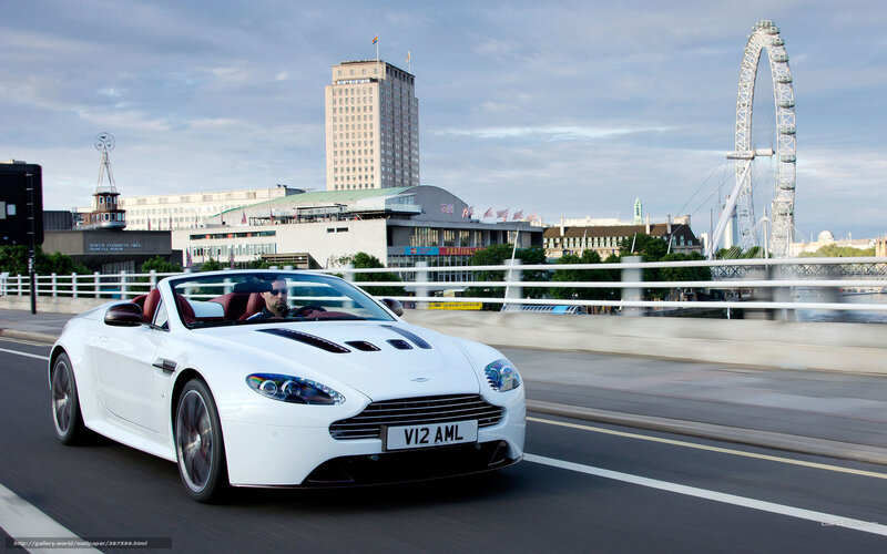 White Aston V12 convertible on London bridge