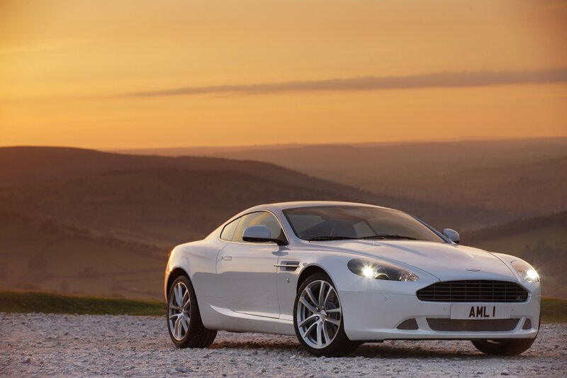 White Aston V8 Vantage at sunset