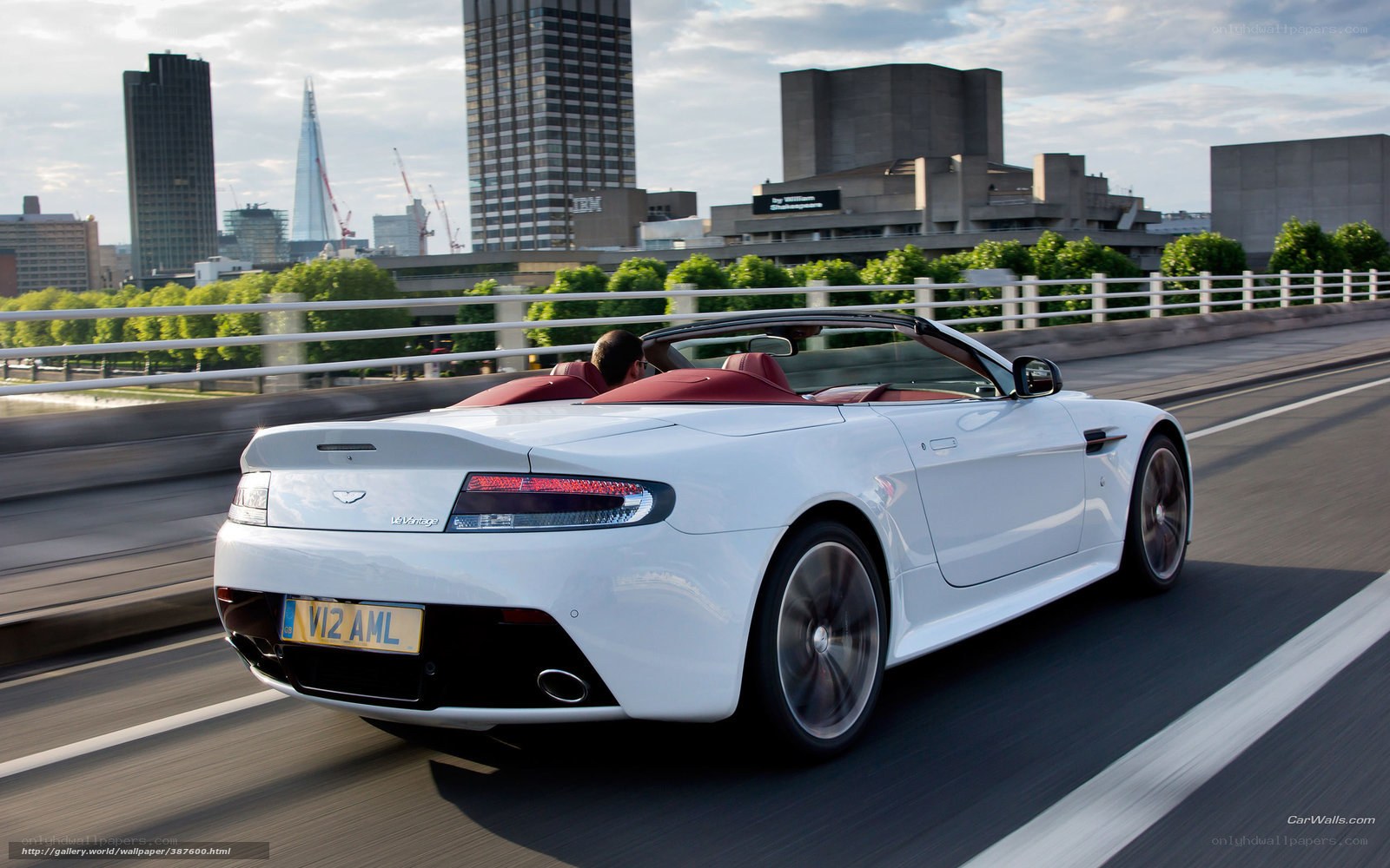 White Aston V8 Vantage driving