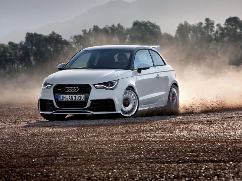 White Audi A1 driving on dirt