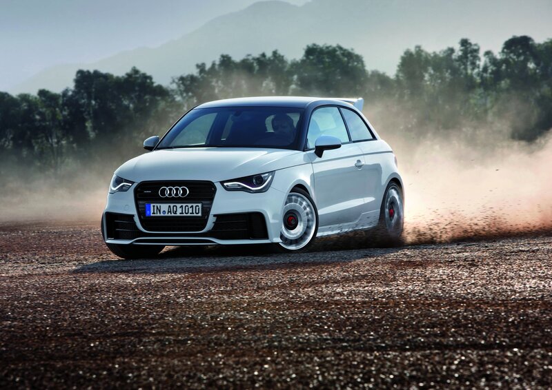 White Audi A1 driving on dirt