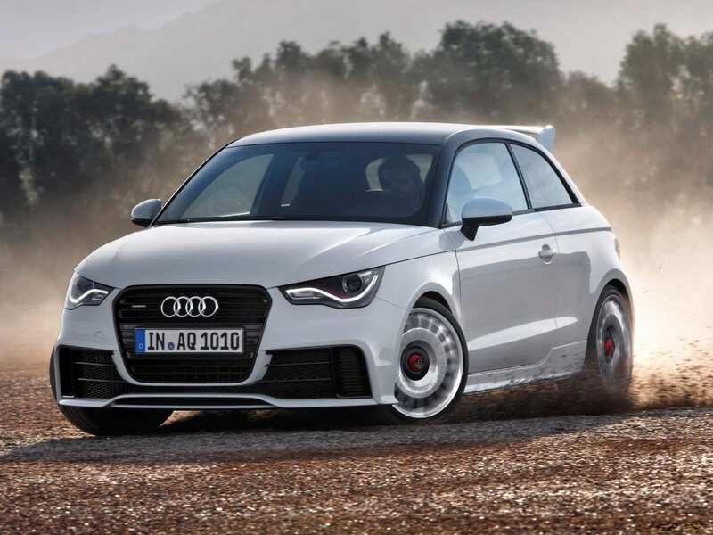White Audi A1 driving on dirt