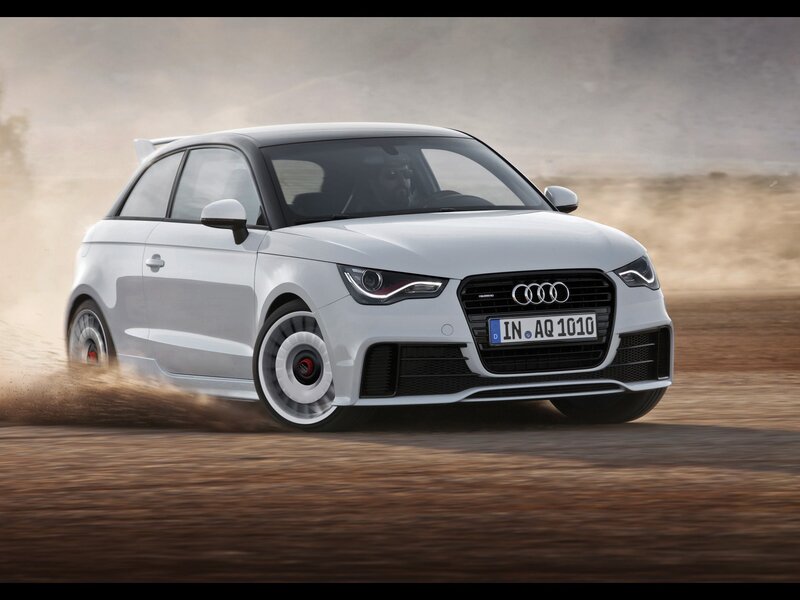 White Audi A1 driving on dirt