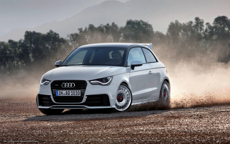 White Audi A1 driving on dirt
