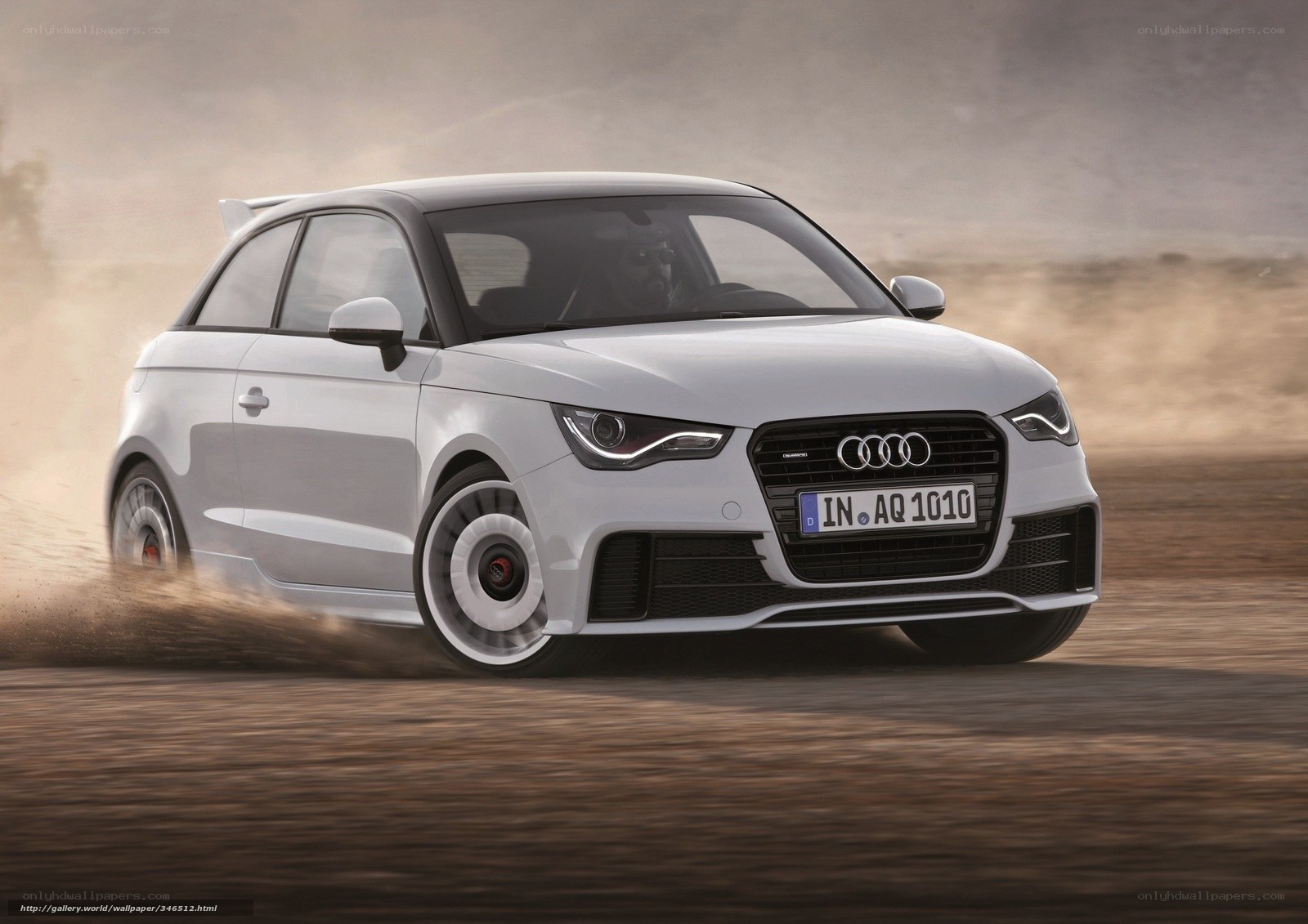 White Audi A1 in motion