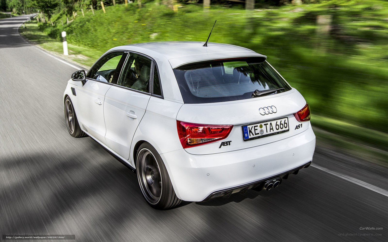 white audi a1 in motion