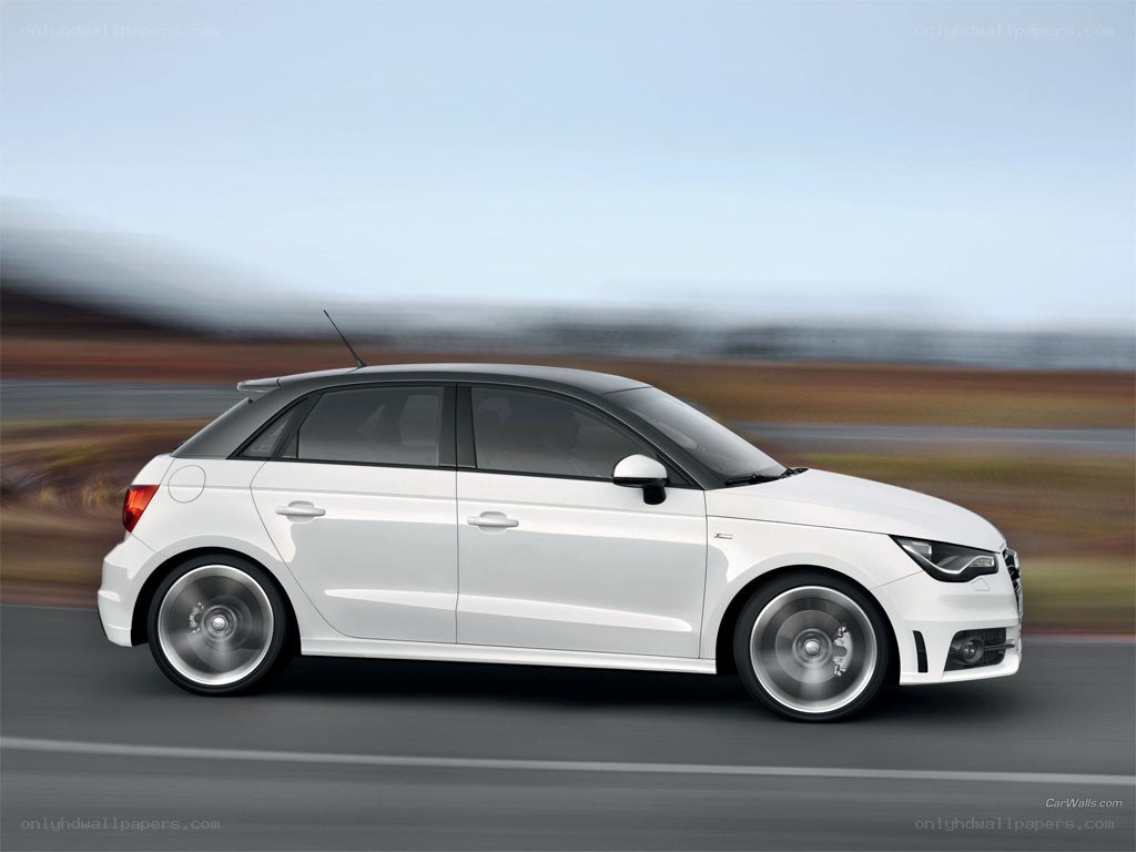 white audi a1 in motion