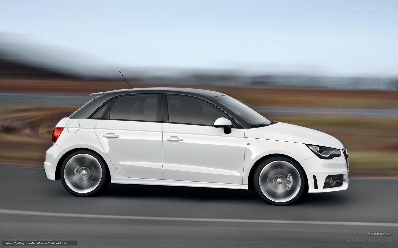 white audi a1 in motion