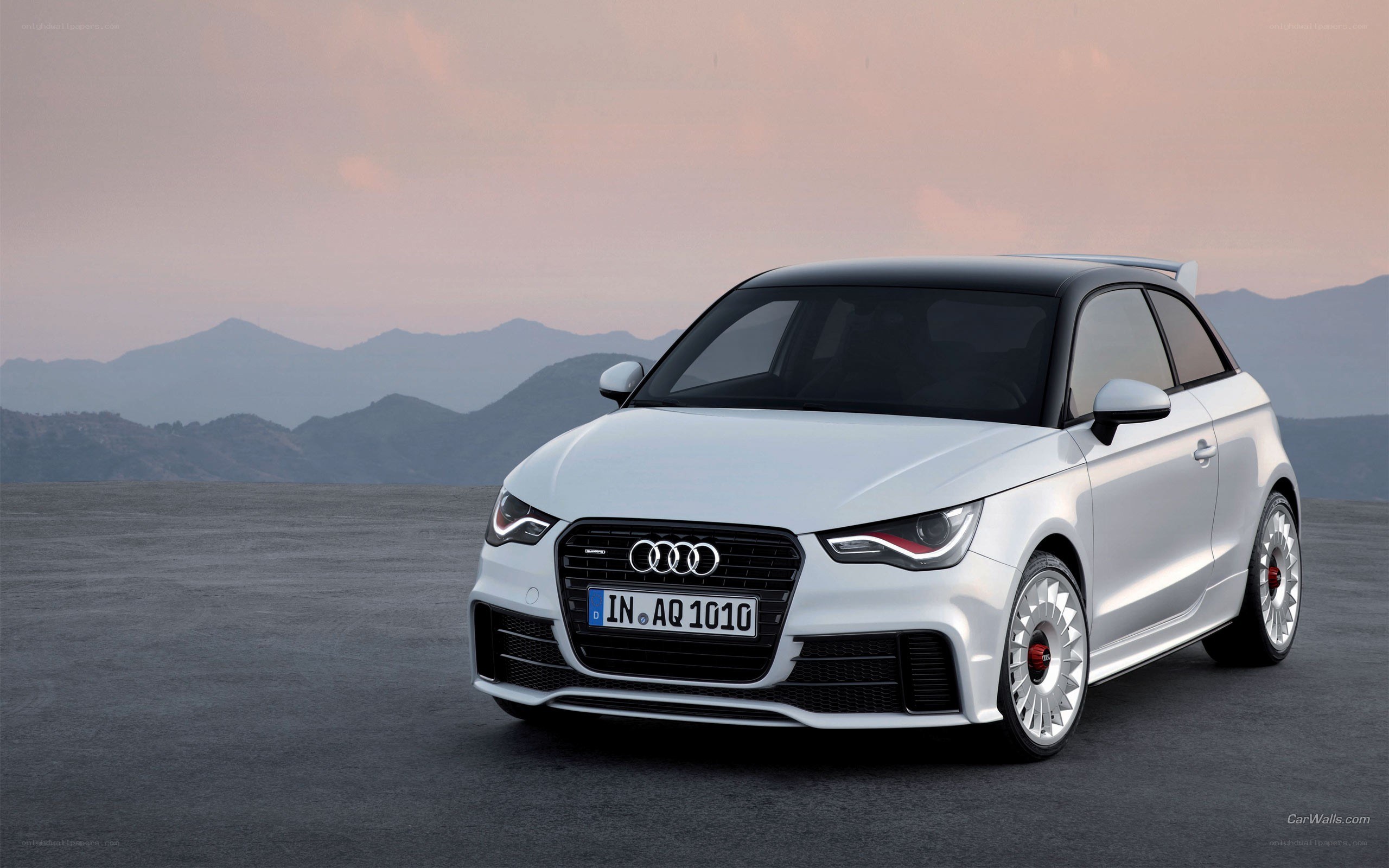 White Audi A1 in mountain landscape