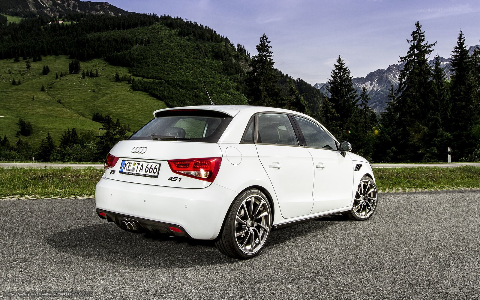White Audi A1 in mountain scenery