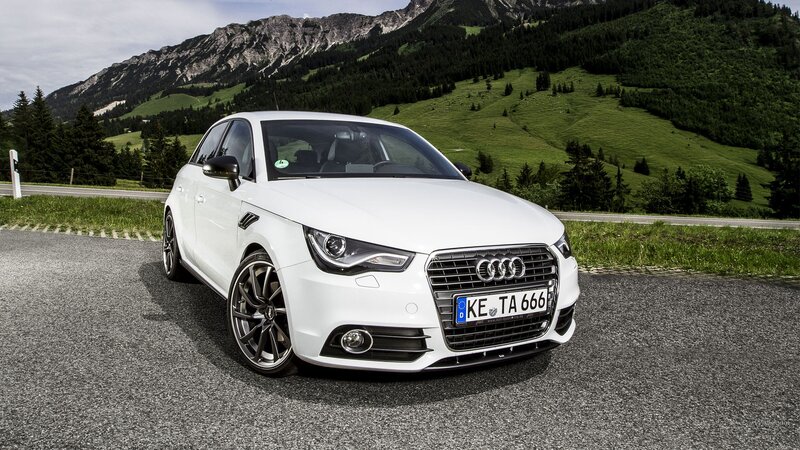 White Audi A1 on mountain road