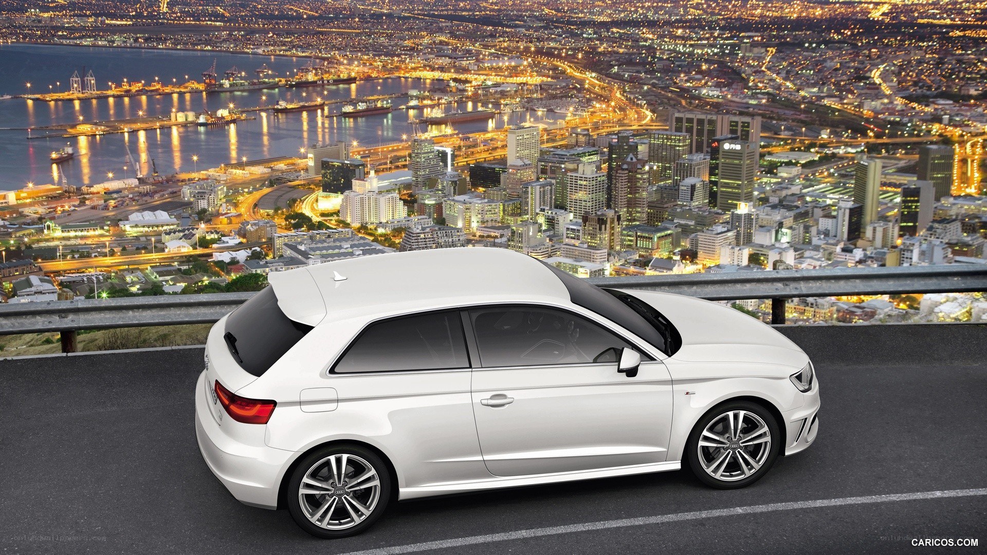 white audi a3 hatchback at night