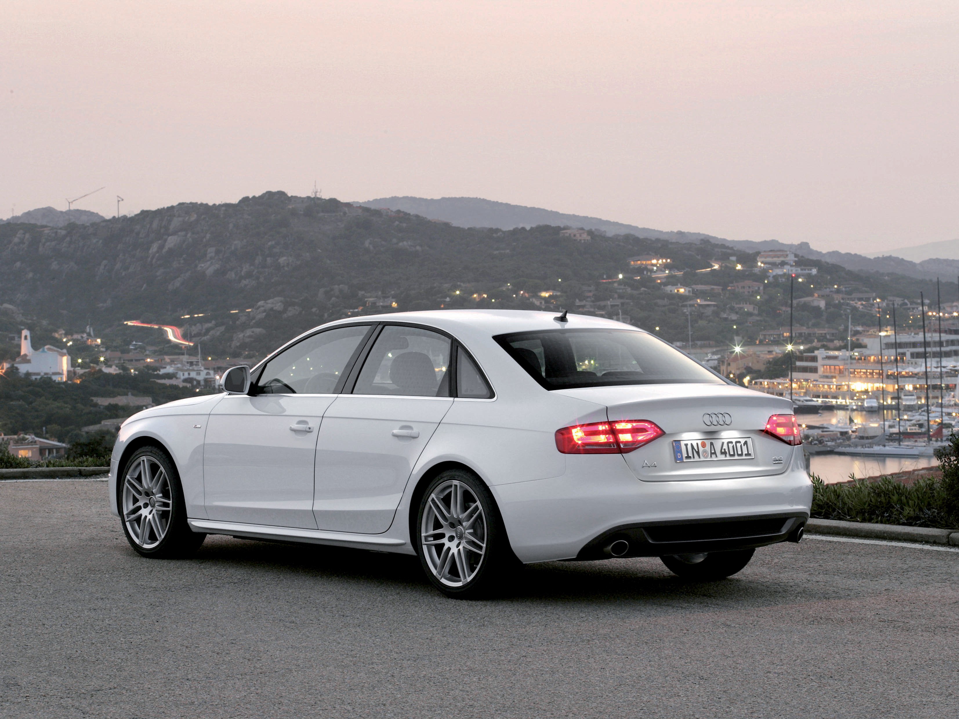 White Audi A4 by the coast