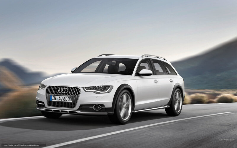 White Audi A6 Allroad in motion