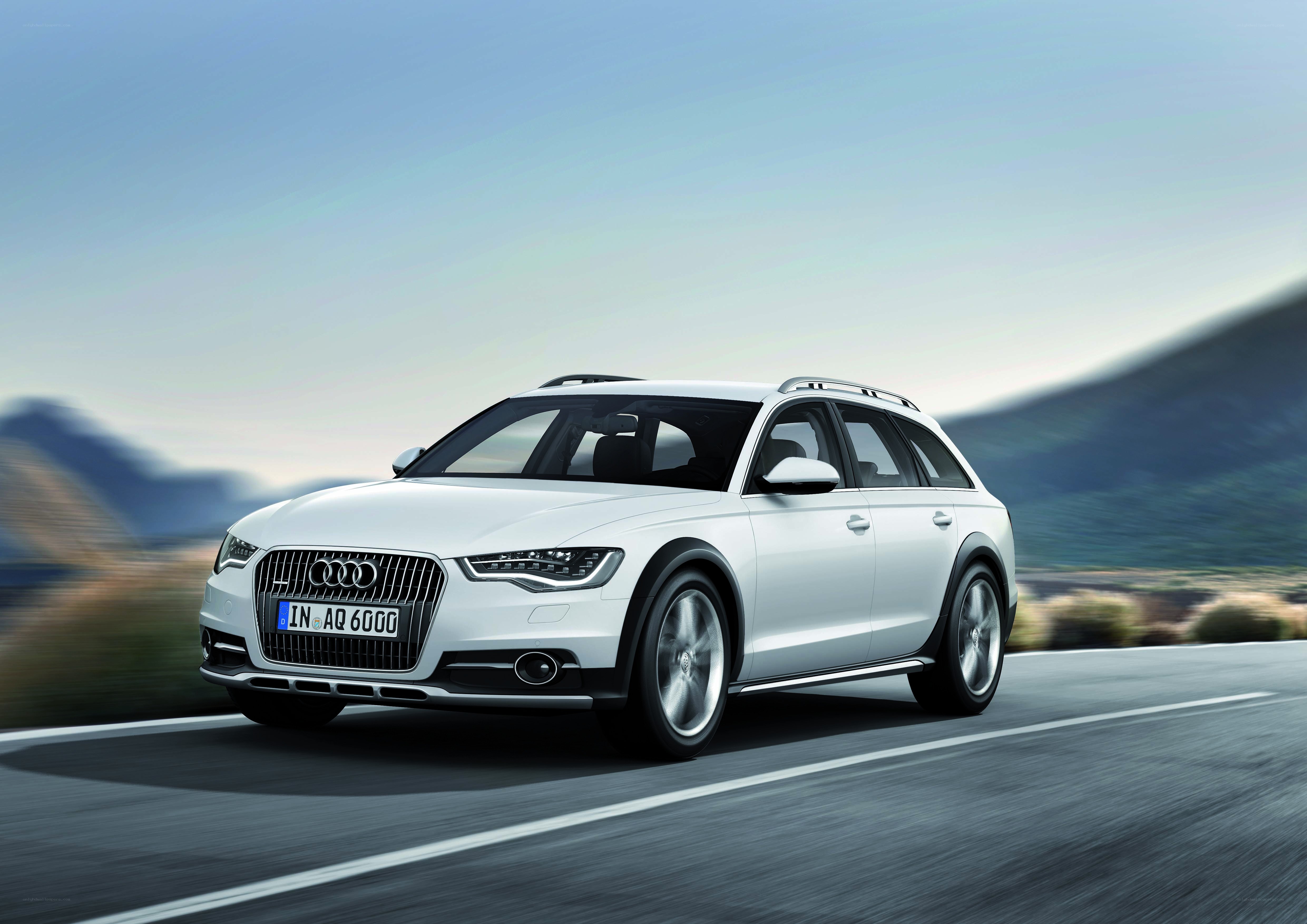 White Audi A6 Allroad on road