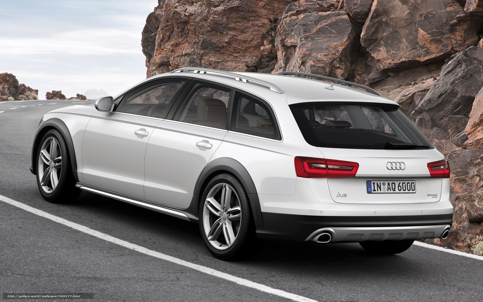 white audi a6 allroad on road
