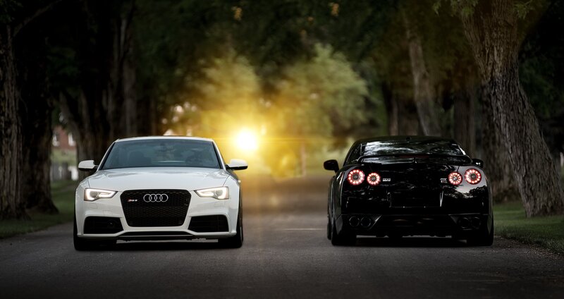 White Audi and Black Nissan