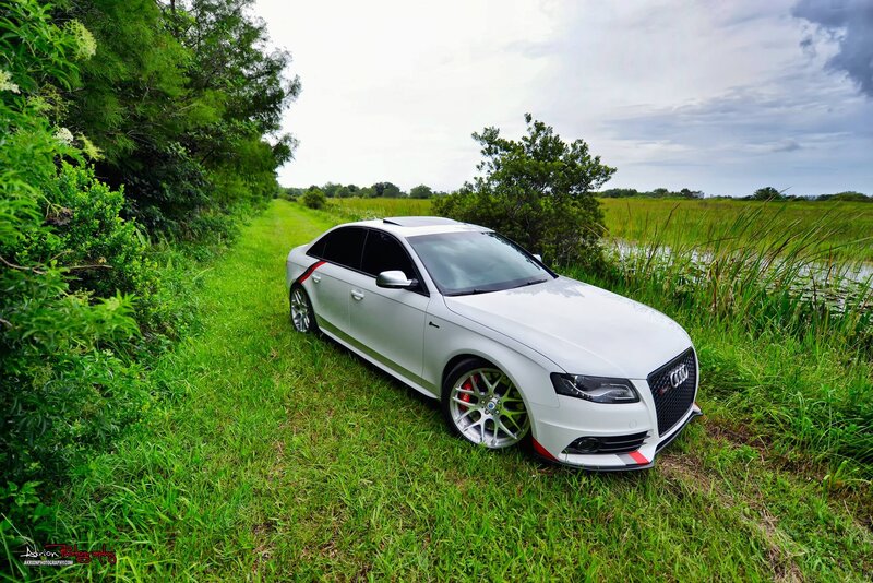 White Audi Car — Green, Serene